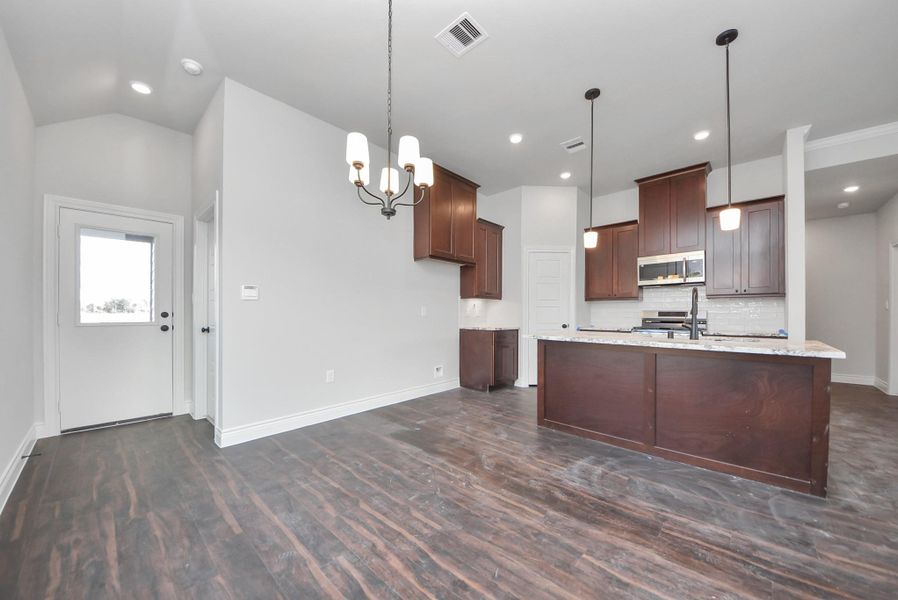 Furnished interior view inside a new home in Hill & Dale Ranch, Splendora (Image 9).
