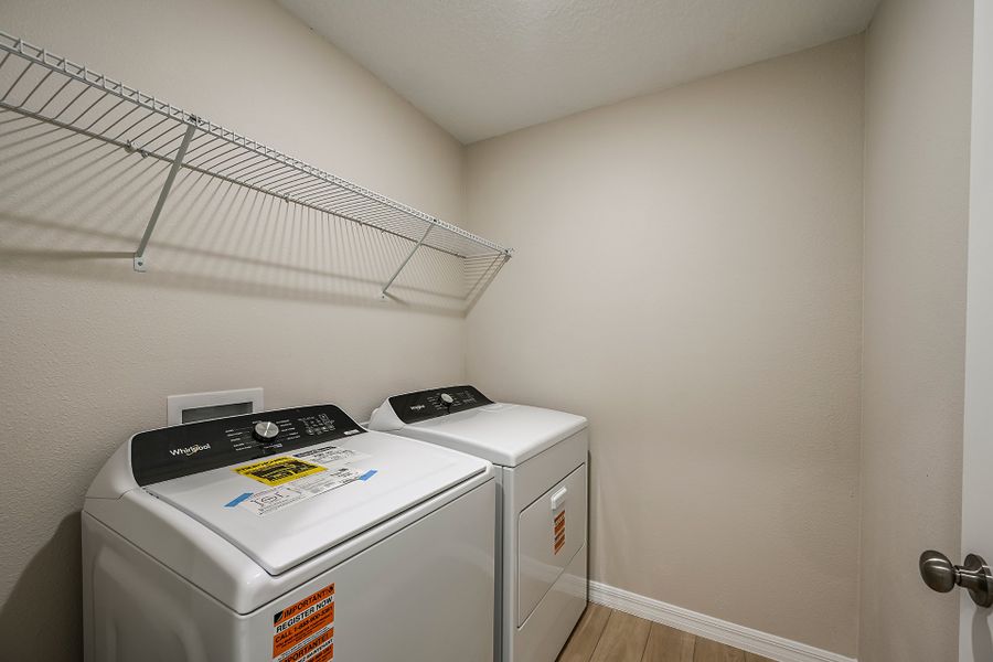 Furnished interior view inside a new home in Scenic Terrace, Haines City (Image 13).