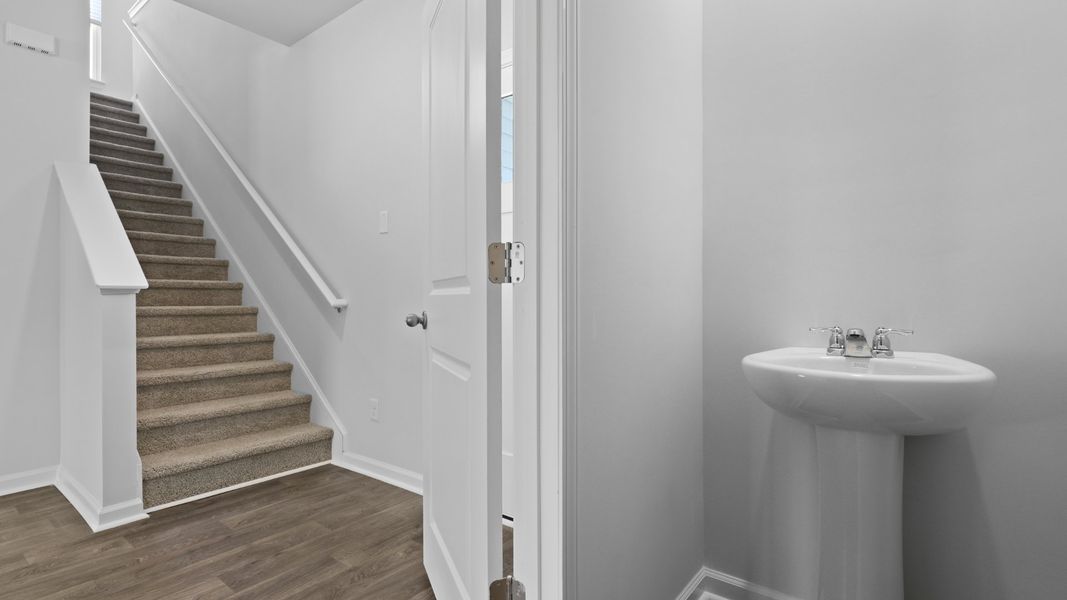 Representative unfurnished interior of a home built from the Aisle by D.R. Horton in Pine Hills at Cane Bay, Summerville (Image 18).