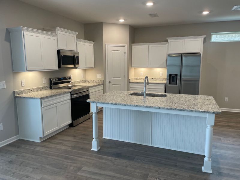 Furnished interior view inside a new home in Brandon Woods, Spring Hill (Image 6).