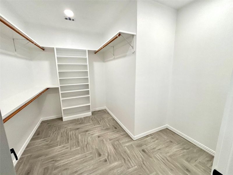 Nice primary walk in closet.