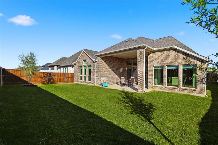 Exterior details and patio area of a home in Watercress 65', Haslet (Image 23). Exterior details and patio area of a home in Watercress 65', Haslet (Image 23).
