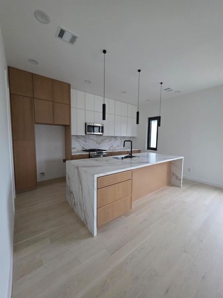 Elevated wide-plank oak flooring