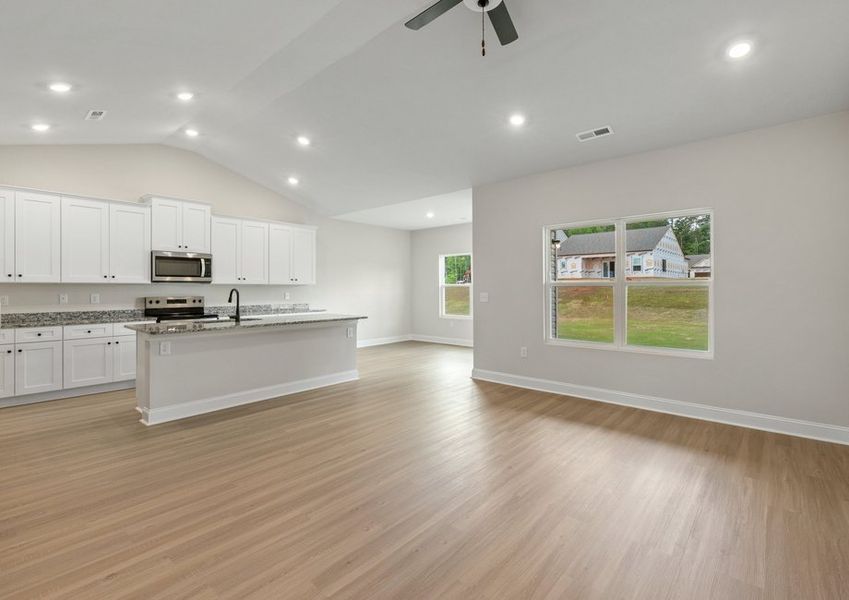 The kitchen is open to the living area The kitchen is open to the living area