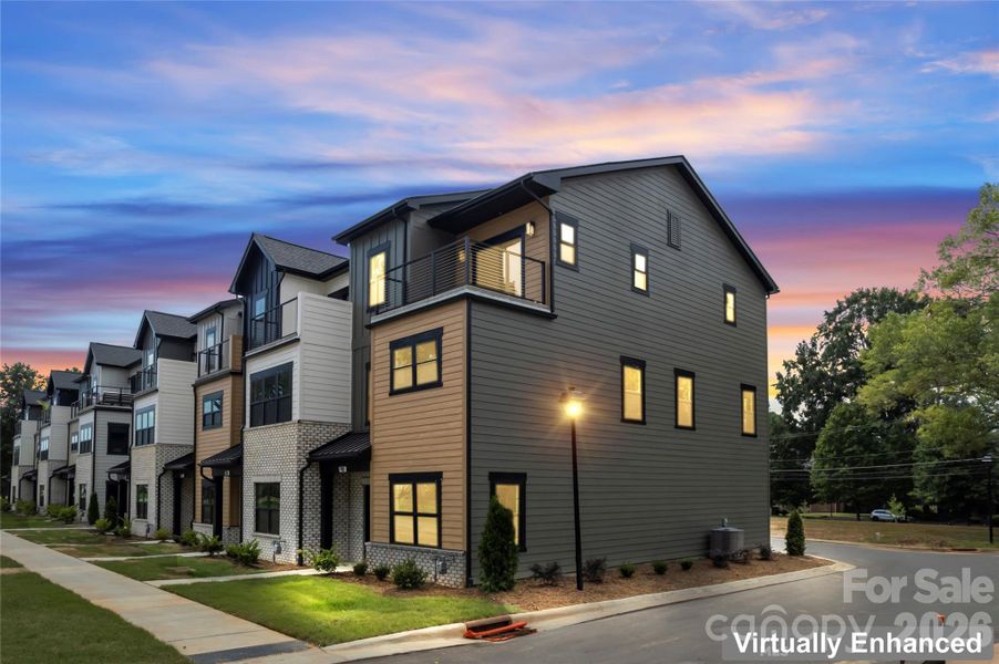 Front exterior of a new home in , Huntersville, NC, highlighting curb appeal (Image 20).