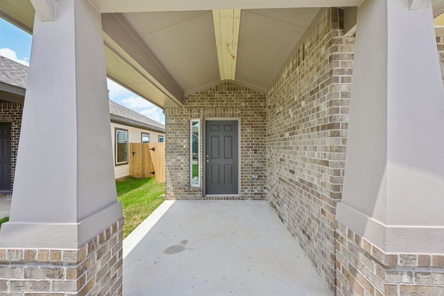 Exterior details and patio area of a home in Azalea, Pattison (Image 3).