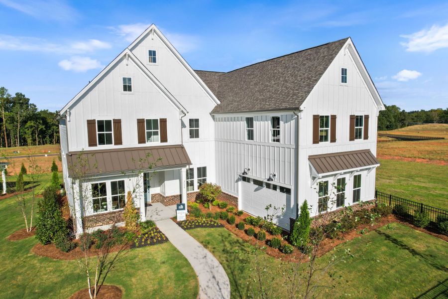 Representative exterior photo of a completed home built from the Stonegate by Pulte Homes in The Retreat at Carolina Ridge, Harrisburg, NC (Image 40). Representative exterior photo of a completed home built from the Stonegate by Pulte Homes in The Retreat at Carolina Ridge, Harrisburg, NC (Image 40).
