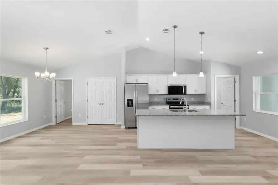 Furnished interior view inside a new home in , Dunnellon (Image 3).