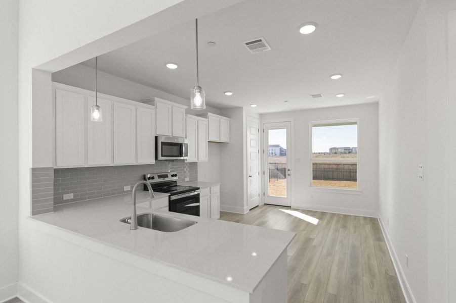 Furnished interior view inside a new home in Avery Centre, Round Rock (Image 8).