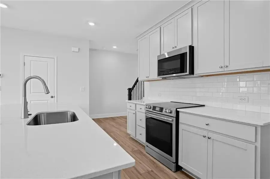 Furnished interior view inside a new home in Towns at Holly Springs, Holly Springs (Image 10).