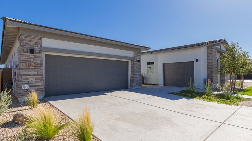 Representative exterior photo of a completed home built from the 50R3 by Taylor Morrison in Ravenna at Rancho Mercado, Surprise, AZ (Image 22).