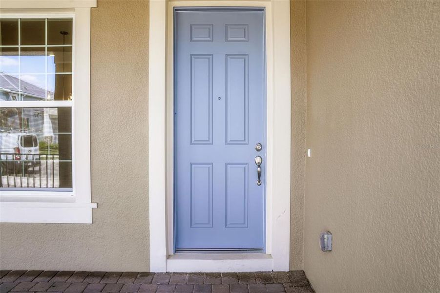 Exterior details and patio area of a home in Palms at Windermere, Windermere (Image 27).
