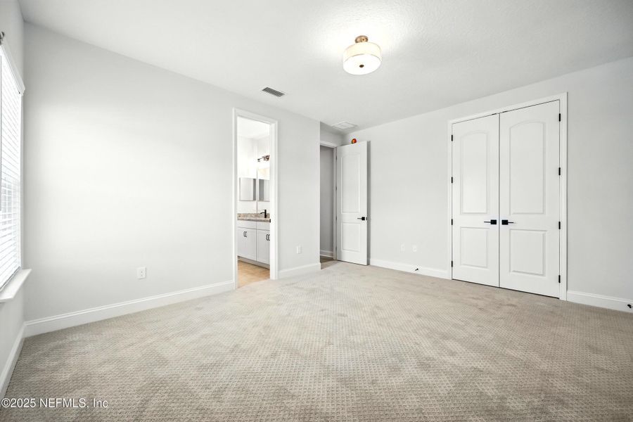 Spacious, unfurnished interior of a new home in Silver Landing At Silverleaf, St. Augustine (Image 19).