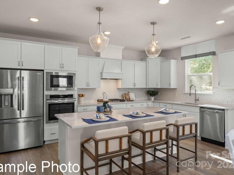 Furnished interior view inside a new home in Enclave at Belmont, Belmont (Image 3). Furnished interior view inside a new home in Enclave at Belmont, Belmont (Image 3).