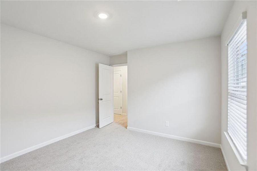 Spacious, unfurnished interior of a new home in Westmont Preserve, Powder Springs (Image 46).