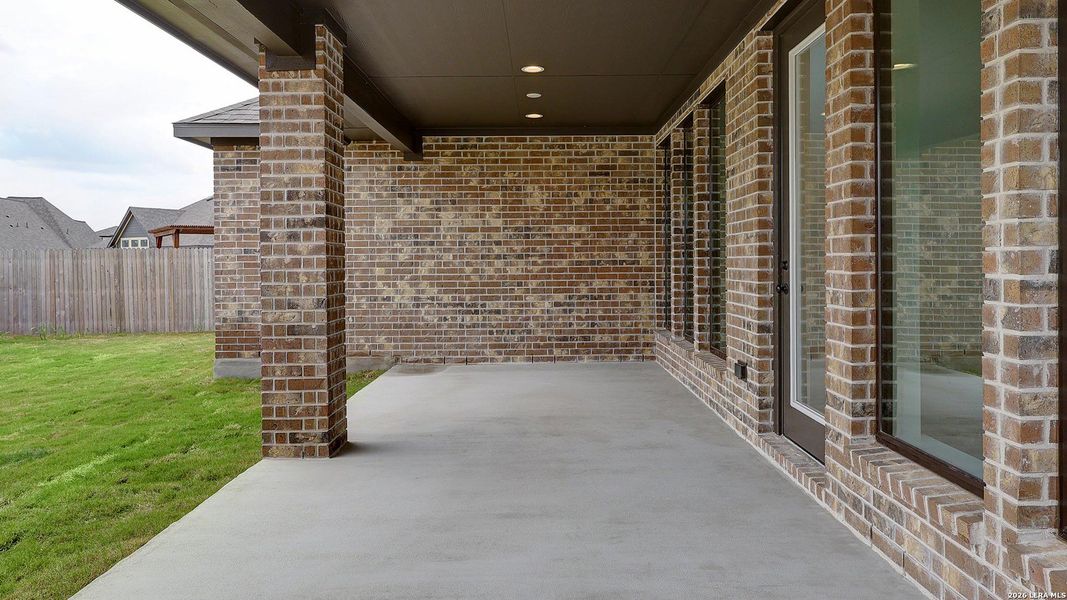 Exterior details and patio area of a home in Alsatian Oaks, Castroville (Image 24).