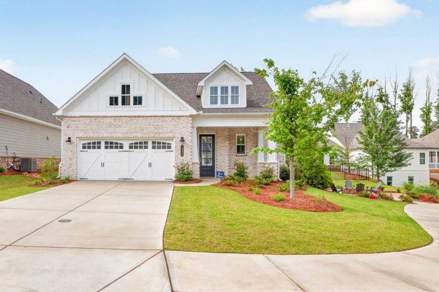 Front exterior of a new home in , Cumming, GA, highlighting curb appeal (Image 26). Front exterior of a new home in , Cumming, GA, highlighting curb appeal (Image 26).