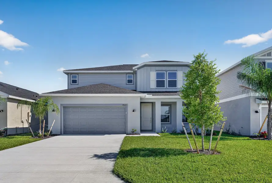 Front exterior of a new home in Willow, Punta Gorda, FL, highlighting curb appeal (Image 1). Front exterior of a new home in Willow, Punta Gorda, FL, highlighting curb appeal (Image 1).