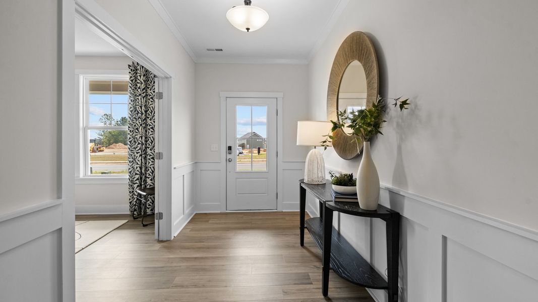 Ample foyer, study entrance, and elevated ceiling, in the Jordan Design by DRB Homes in York, SC
