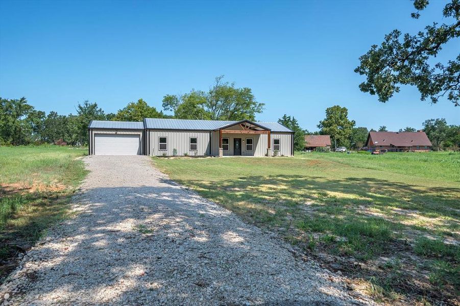 Front exterior of a new home in , Canton, TX, highlighting curb appeal (Image 2). Front exterior of a new home in , Canton, TX, highlighting curb appeal (Image 2).