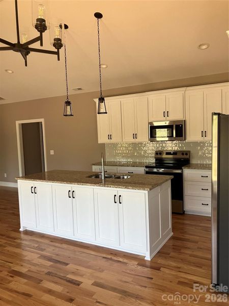 Furnished interior view inside a new home in , Hickory (Image 6).