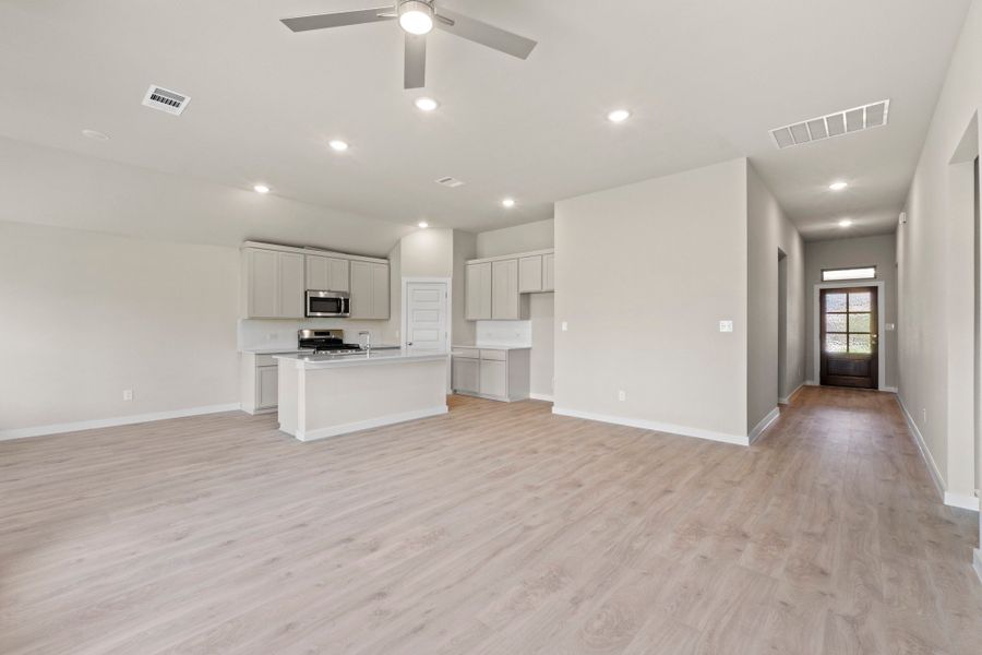 Representative unfurnished interior of a home built from the Nueces by Trophy Signature Homes in Prairie Winds, Hutto (Image 16).