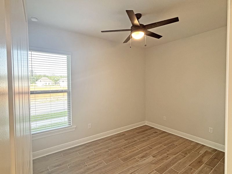 Spacious, unfurnished interior of a new home in Bird Song at Hammock Bay, Freeport (Image 16).