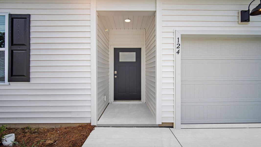 Exterior details and patio area of a home in The Retreat at East Argent, Ridgeland (Image 3).