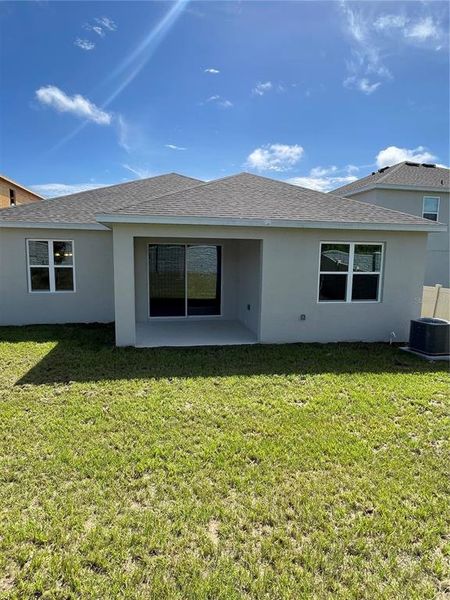 Front exterior of a new home in Park View at the Hills, Minneola, FL, highlighting curb appeal (Image 12).