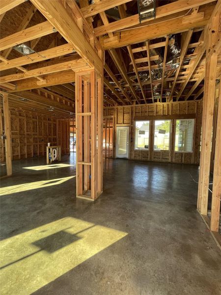 Foyer Entry open to the Dining room on the left and inviting family room straight ahead.