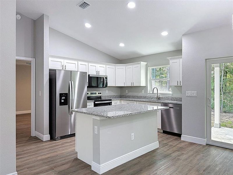 Furnished interior view inside a new home in , Dunnellon (Image 31).