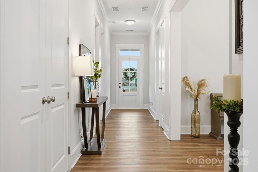Front entry-way welcomes you to crown moldings & 10' ceilings