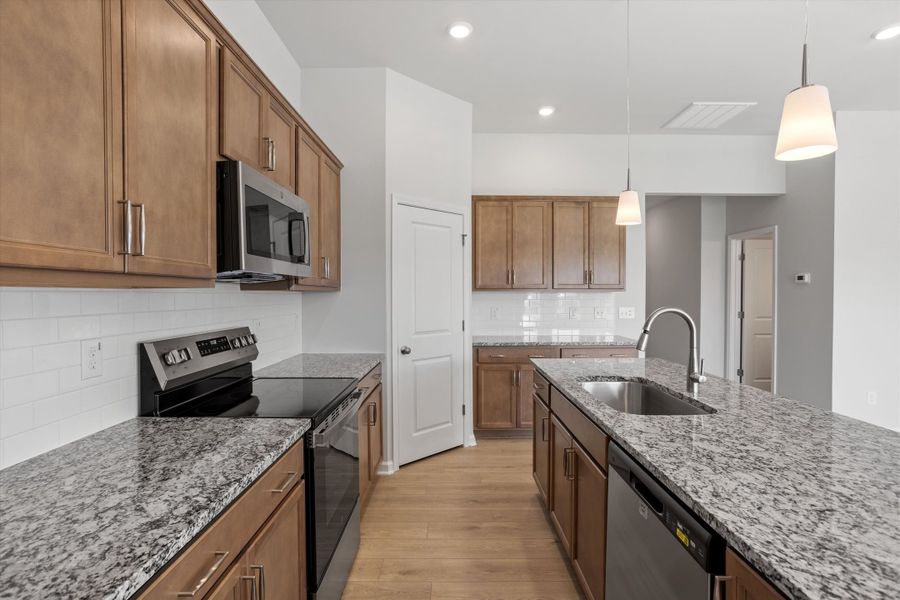 Furnished interior view inside a new home in Cambridge Reserve, Angier (Image 11).