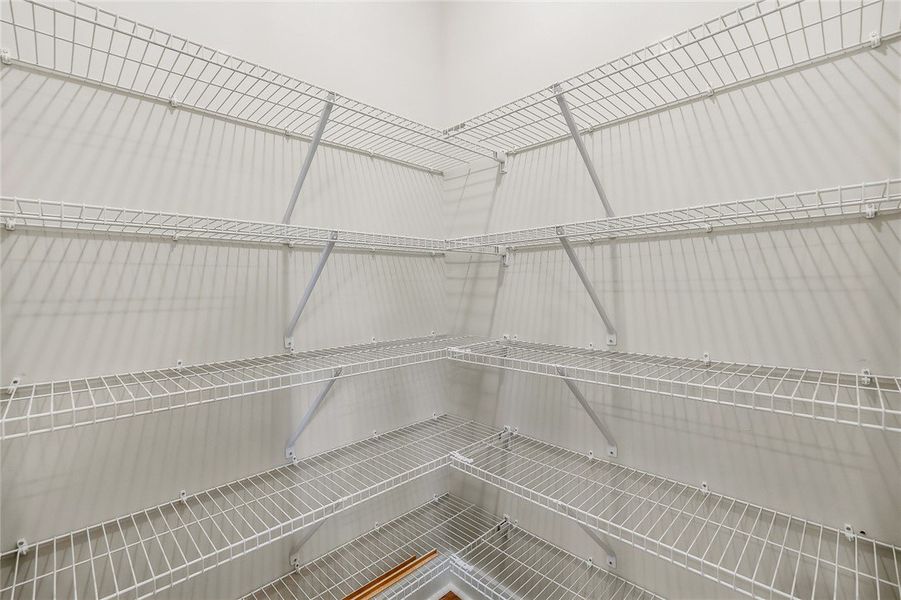 Generous wire shelving wraps around this functiona