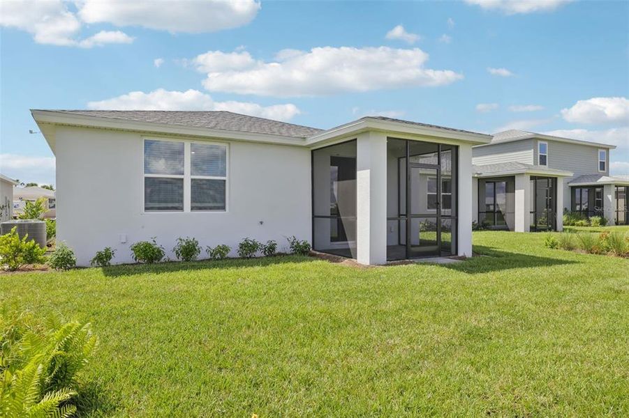 Exterior details and patio area of a home in Crescent Lakes - Premier Series, Punta Gorda (Image 21).