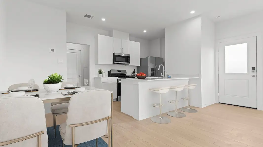 Furnished interior view inside a new home in Lexington Village, Missouri City (Image 9).
