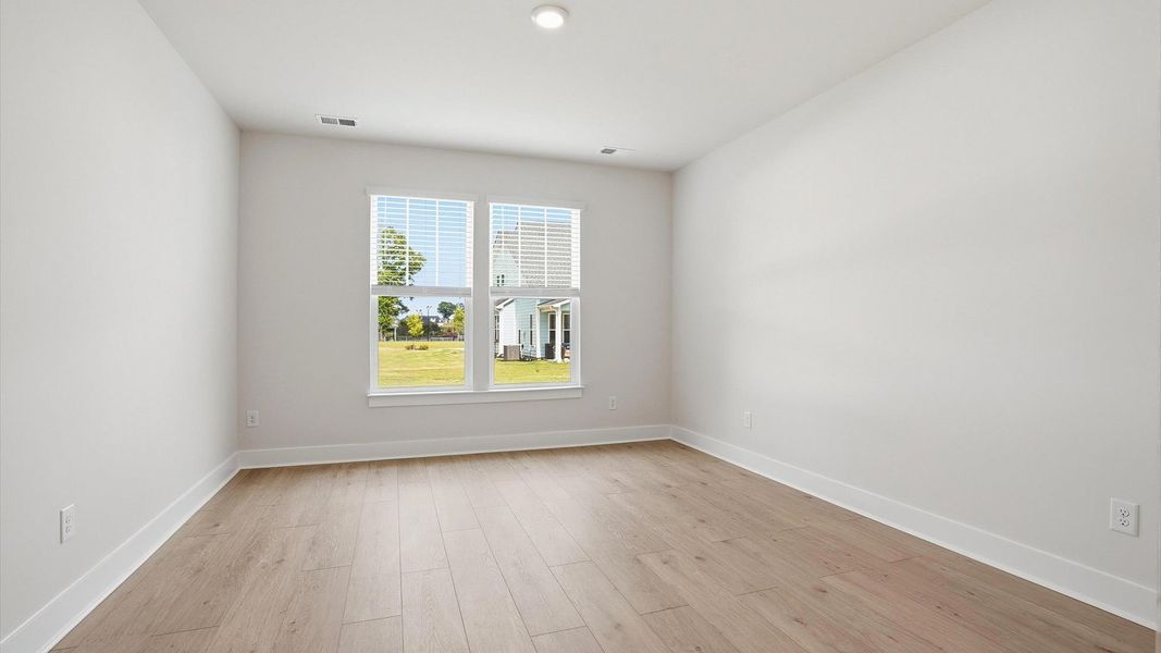 Furnished interior view inside a new home in Village at Midway, Anderson (Image 16).