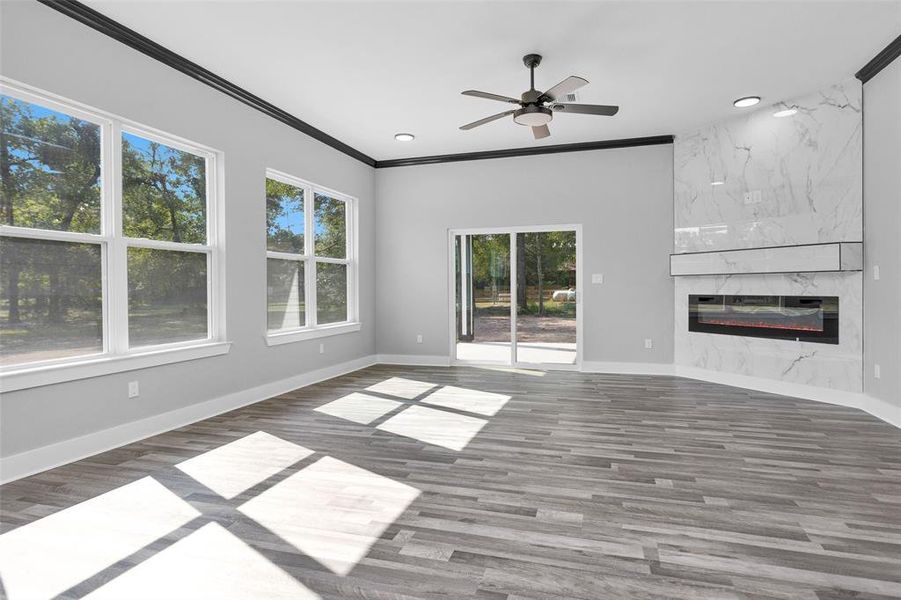 View of living area. Notice sliding doors leading out to covered 12x12 porch.