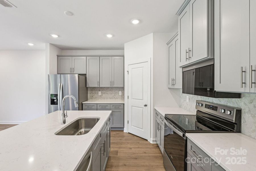 Photo is not of the actual home, but is an inspirational photo of builder’s model home and may depict options, furnishings, and/or decorator features that are not included