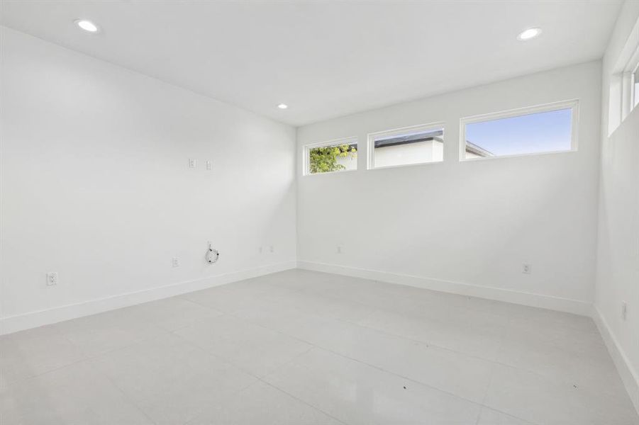 View of tiled spare room