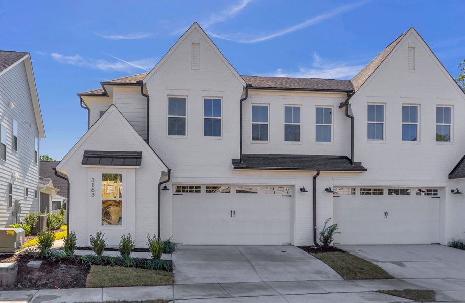 Representative exterior photo of a completed home built from the The Seagrass by RobuckHomes in East & Mason, Wilmington, NC (Image 28). Representative exterior photo of a completed home built from the The Seagrass by RobuckHomes in East & Mason, Wilmington, NC (Image 28).