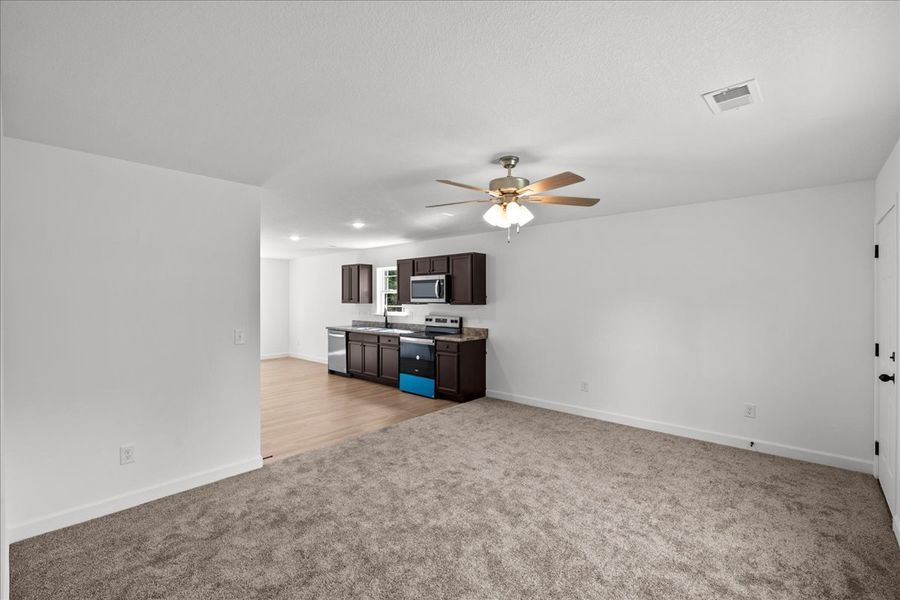 Representative unfurnished interior of a home built from the Riley by Enchanted Homes in Las Palomas Country Club Estates, La Vernia (Image 11). Representative unfurnished interior of a home built from the Riley by Enchanted Homes in Las Palomas Country Club Estates, La Vernia (Image 11).