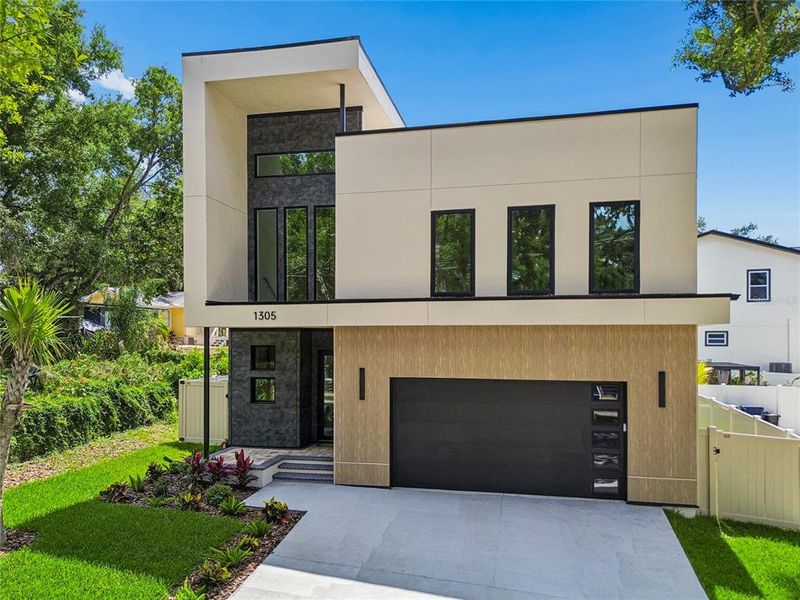 Front exterior of a new home in , Tampa, FL, highlighting curb appeal (Image 33).
