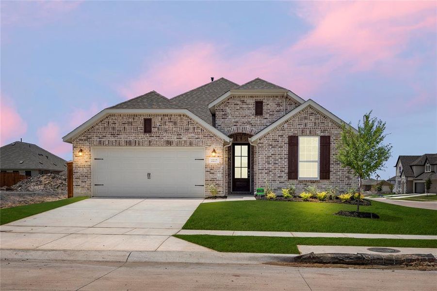 Front exterior of a new home in Walden Pond, Forney, TX, highlighting curb appeal (Image 2).