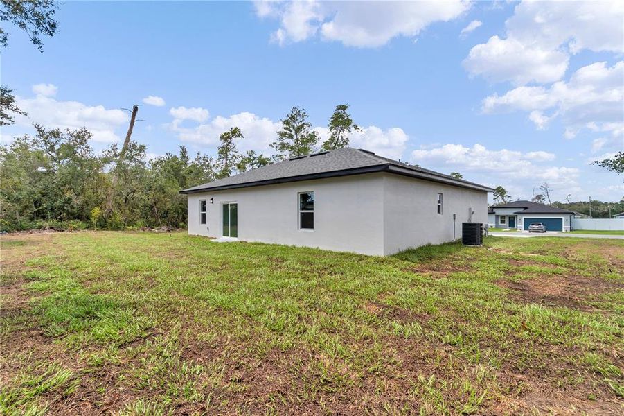 Exterior details and patio area of a home in , Ocala (Image 31).