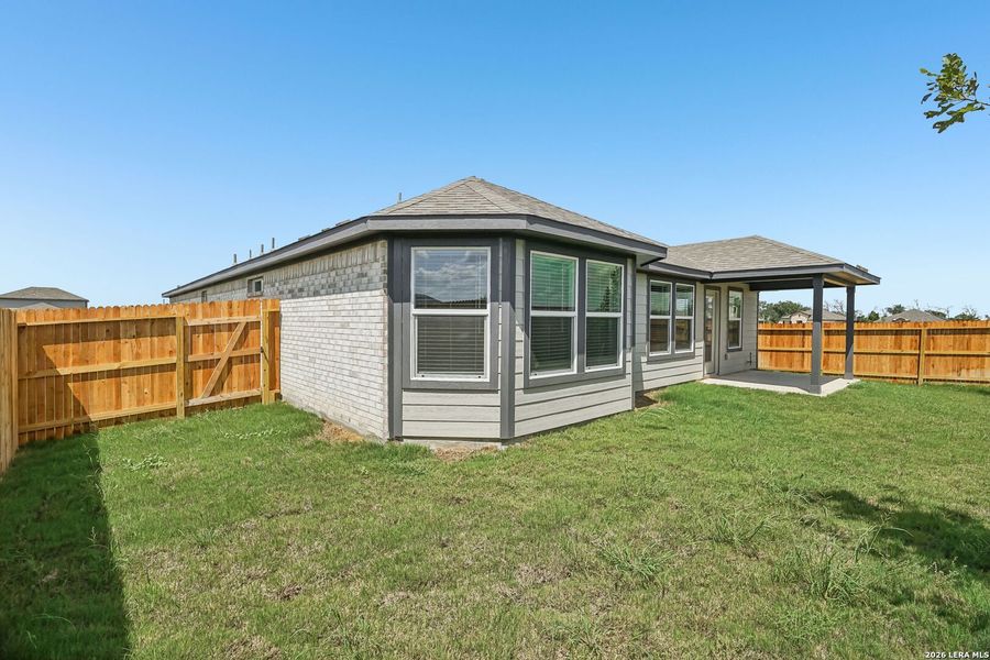 Exterior details and patio area of a home in Carmel Ranch, Schertz (Image 4).