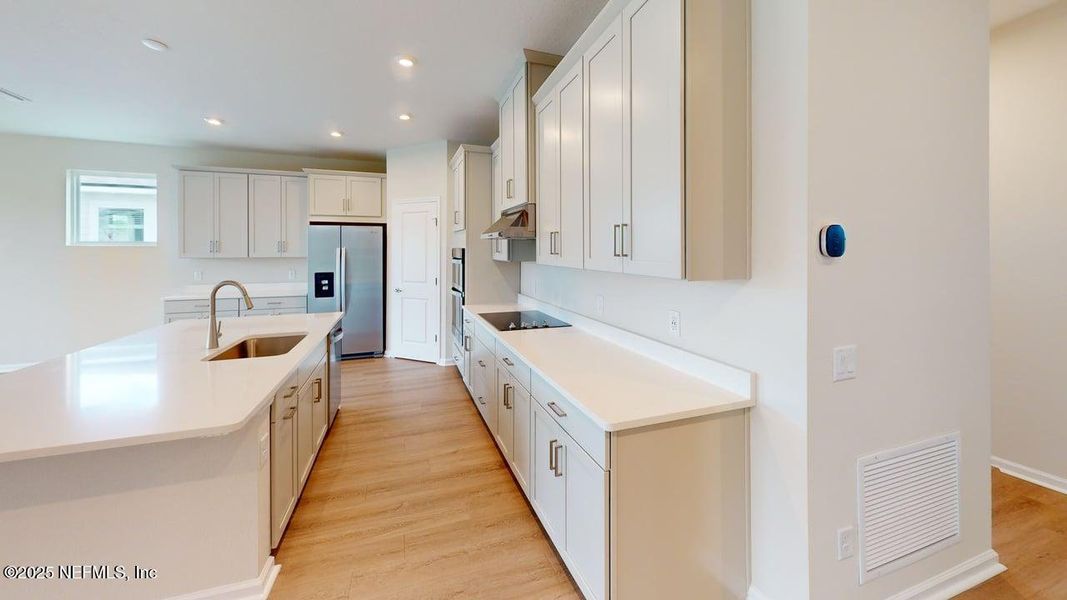 Furnished interior view inside a new home in Lakes at Bella Lago, Green Cove Springs (Image 8). Furnished interior view inside a new home in Lakes at Bella Lago, Green Cove Springs (Image 8).