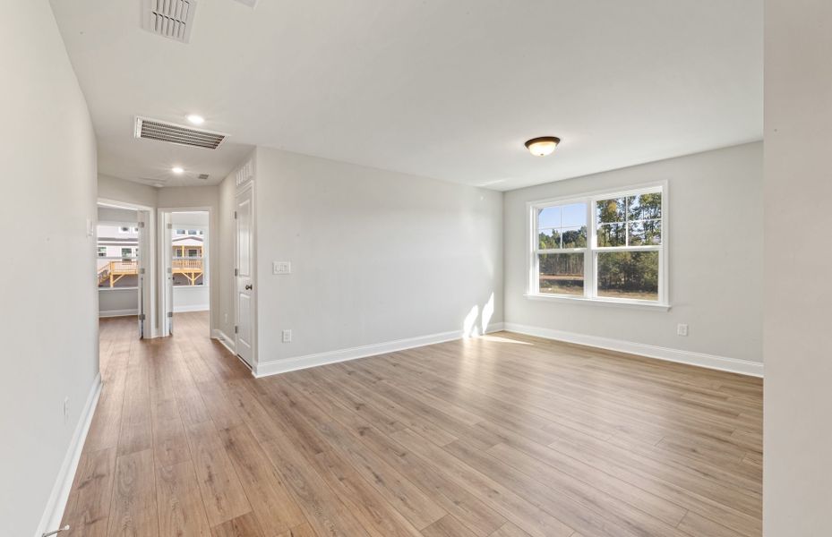 Spacious, unfurnished interior of a new home in Browning Stables, Wendell (Image 21).