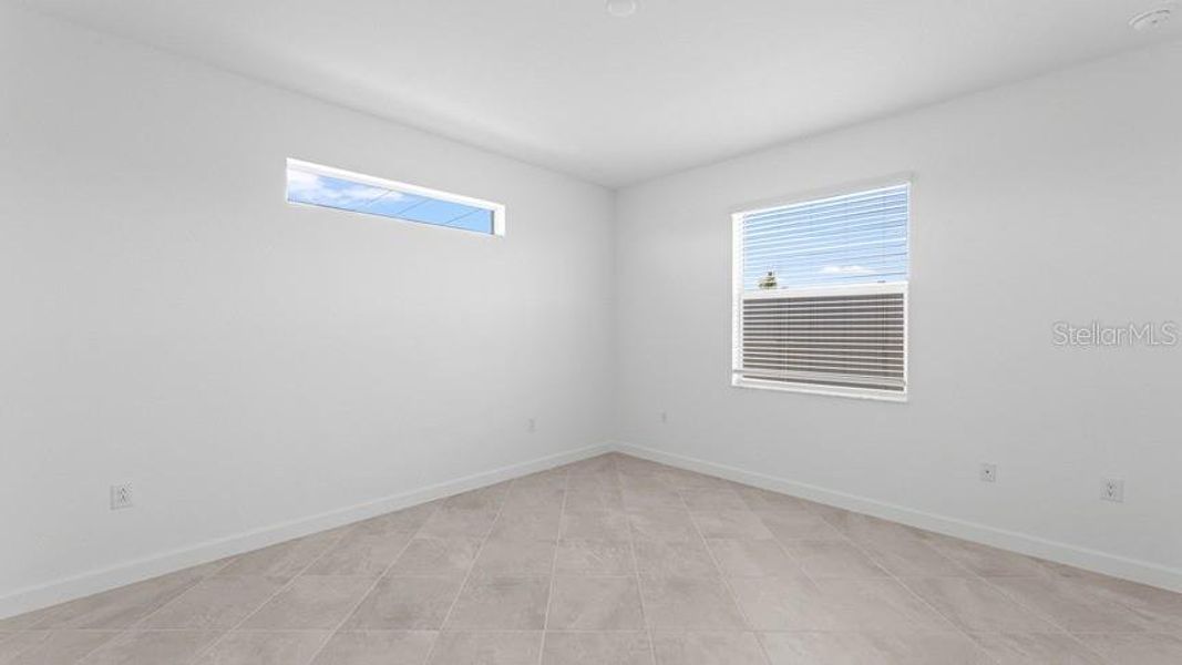Spacious, unfurnished interior of a new home in Palm Lake at Coco Bay, Englewood (Image 29).