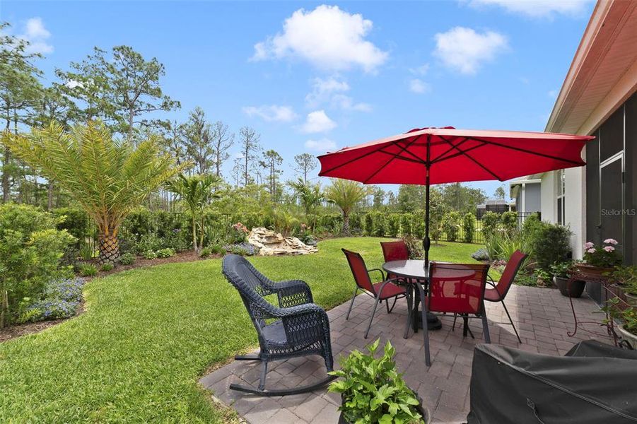 Exterior details and patio area of a home in Del Webb Sunbridge, St. Cloud (Image 22).